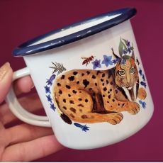 Plecháček - rys v pelíšku